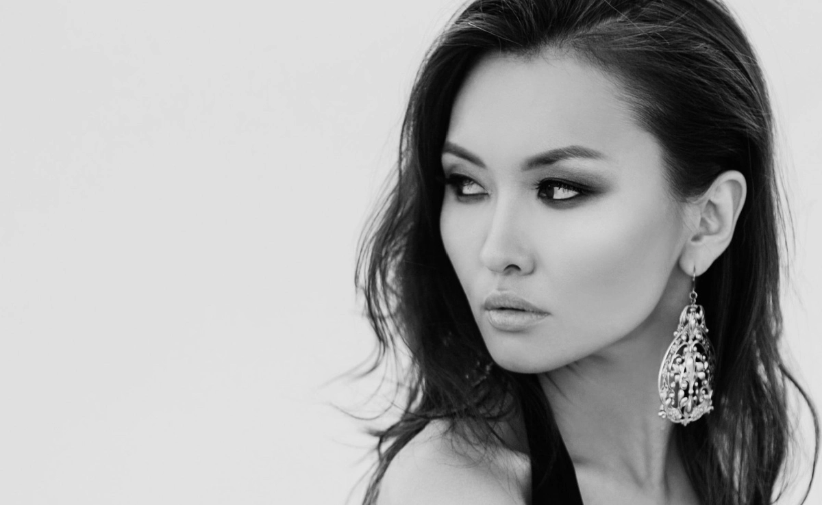 Beautiful sexy asian woman in desert. Black and white photo